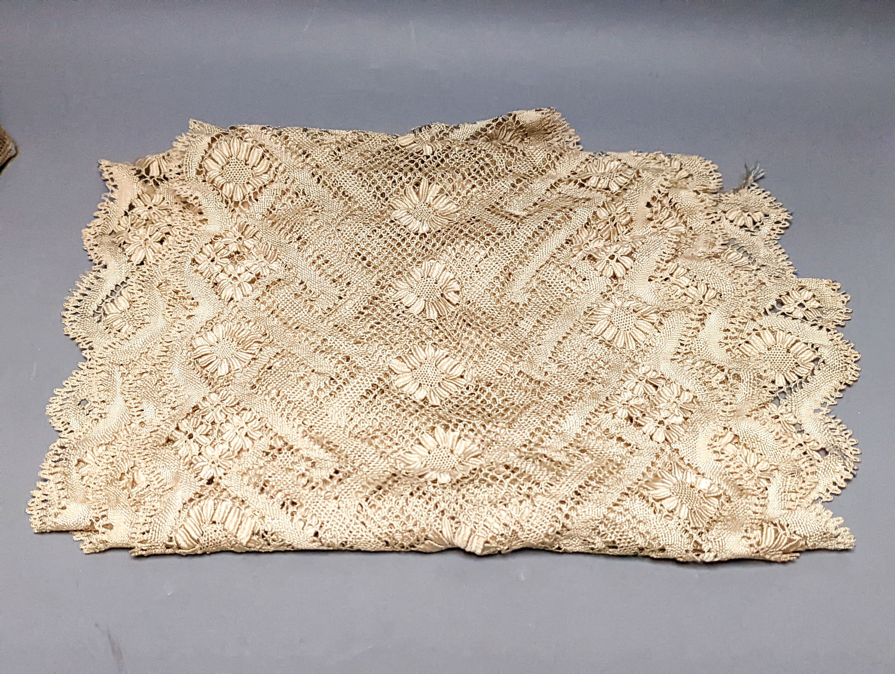 A filet lace box containing a silk Maltese hand bobbin lace veil and stole and an Irish crochet collar and machine net veil